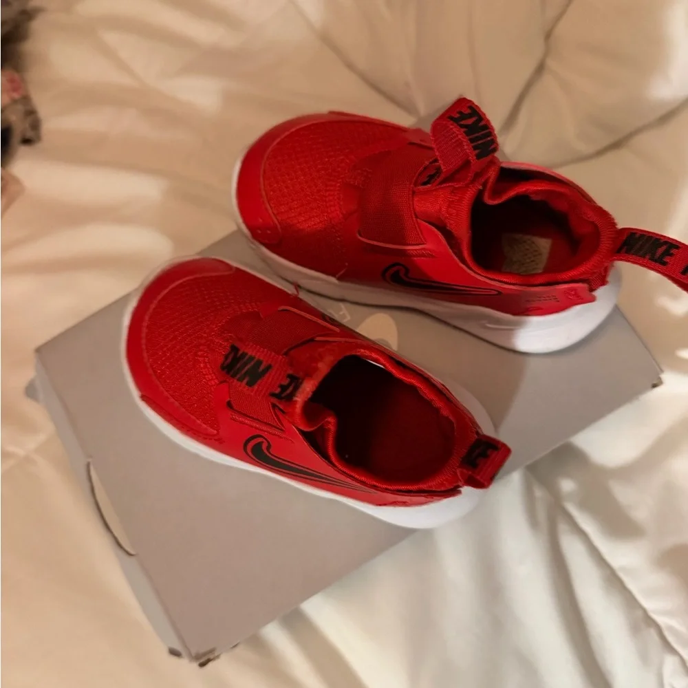 Nike Red Kids Slip-On Sneakers with Black Swoosh